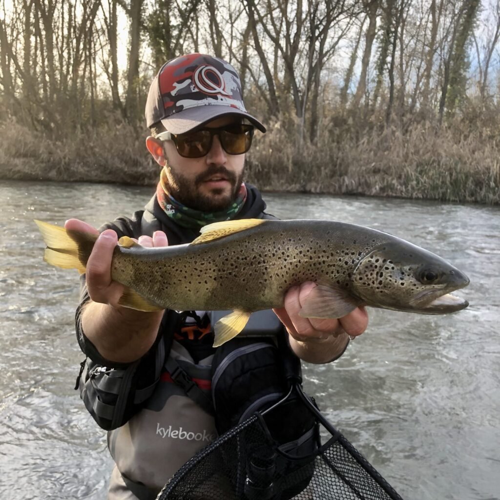 guia e pesca amb captura de truita
